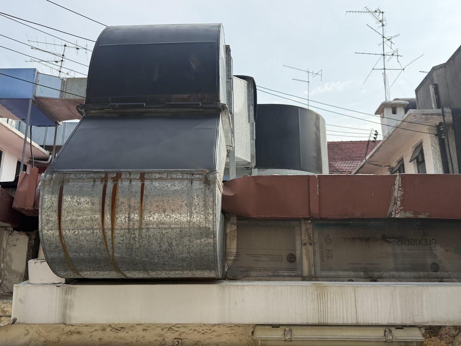 Close view of metal exhaust ductwork